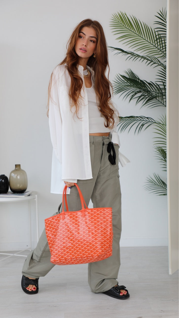 outfit orange goyard bag